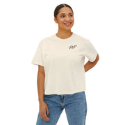 Woman wearing a white t-shirt with a black design on a white background